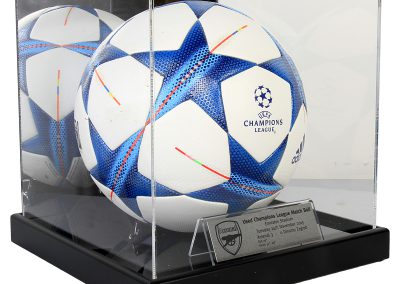 Match used Champions league football in display case
