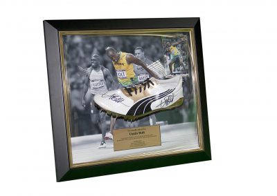 Framed and signed Usain Bolt shoe in dome