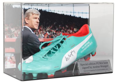 Puma boot signed by Arsene Wenger in display box